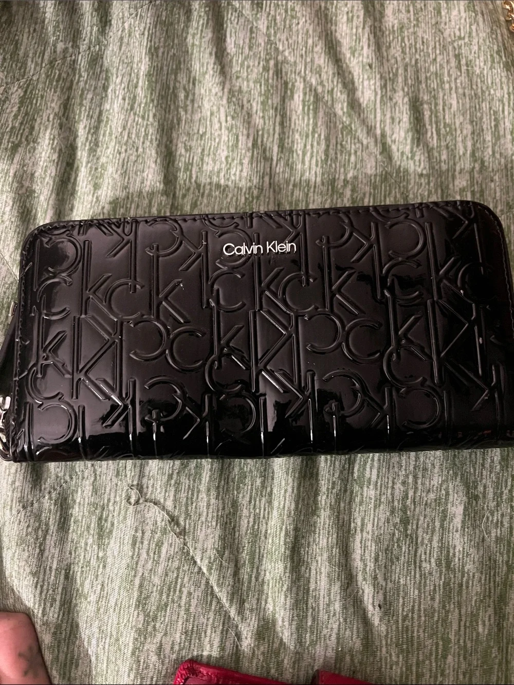 Calvin Klein Glossy Black Embossed Logo Zip Wallet
